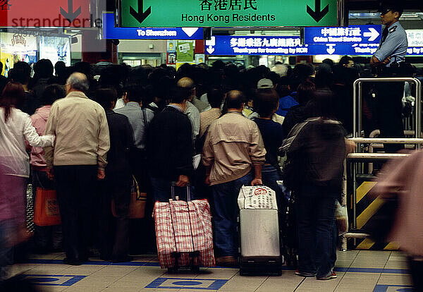 A crush of people at the Hong Kong and China border crossing.