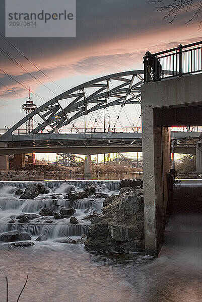 A beautiful days end sunset on the South Platte River at Confluence park in Denver  Colorado.