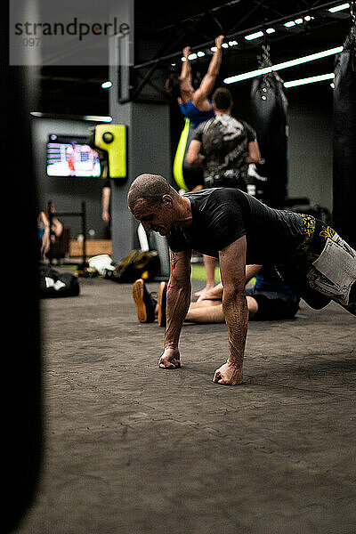 Man training in boxing in the gym.