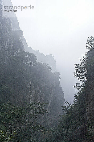 A foggy landscape on the way to the San Huang Zhai Monastery on Song Mountain  China.