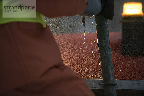 Water pump used by man to replicate ice storm for research