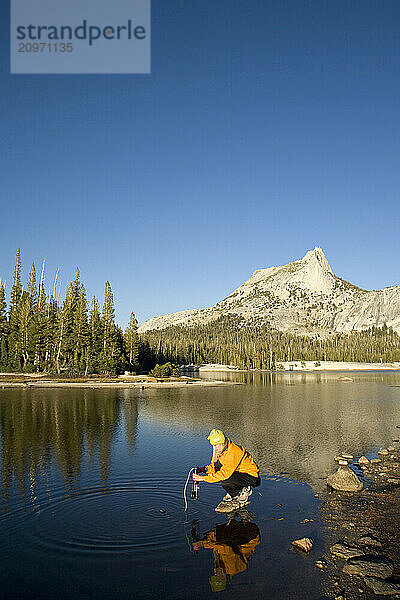 A woman backpacking in Yosemite National Park  California.