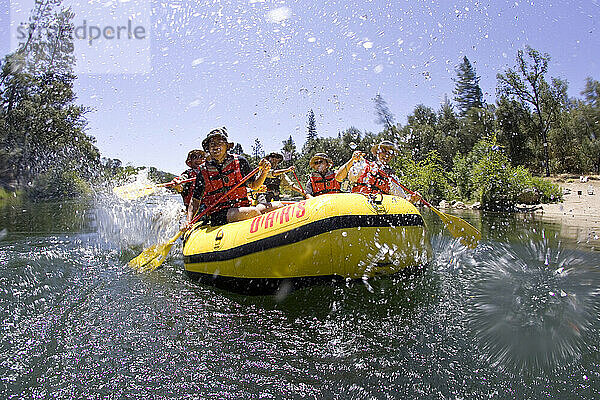 Group of people rafting down the South Fork of the American River. Coloma  CA