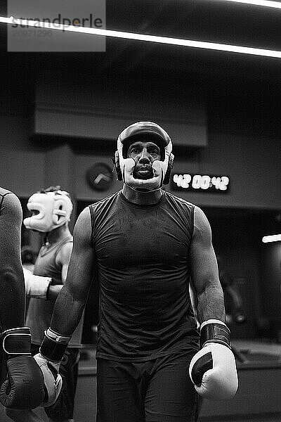 Boxers fighting in boxing training in the gym.