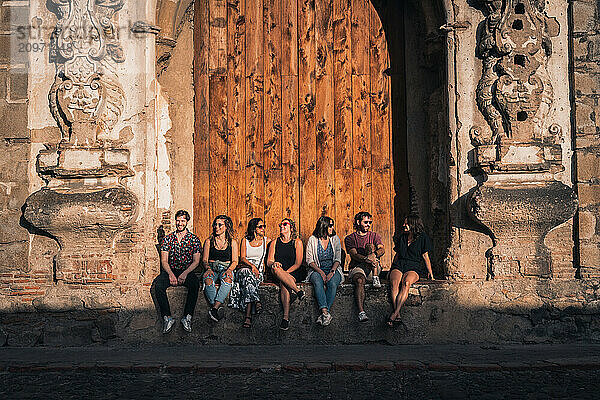 Group of Travelers Laughing Together in Antigua Guatemala