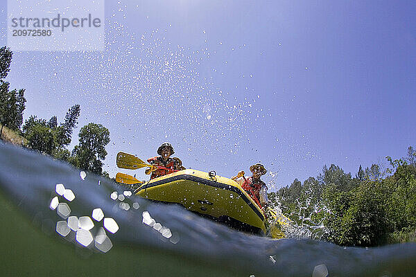 Group of people rafting down the South Fork of the American River. Coloma  CA