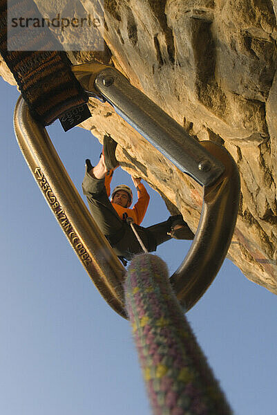 Man above protection hook  Salt Lake City  Utah.