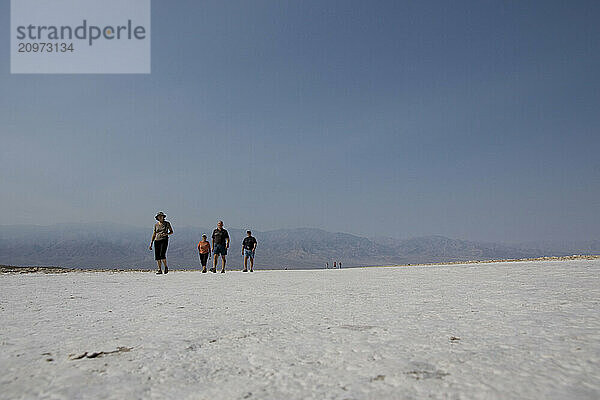 Tourists in Badwater Basin  Death Valley  California.