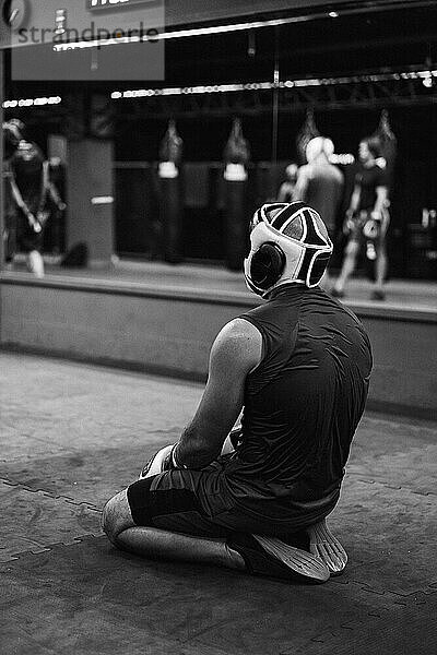 Boxers fighting in boxing training in the gym.