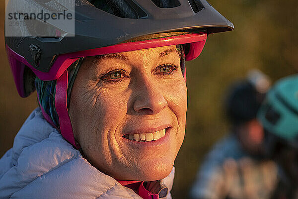 Portrait of woman smiling while looking away  Duluth  Minnesota  USA