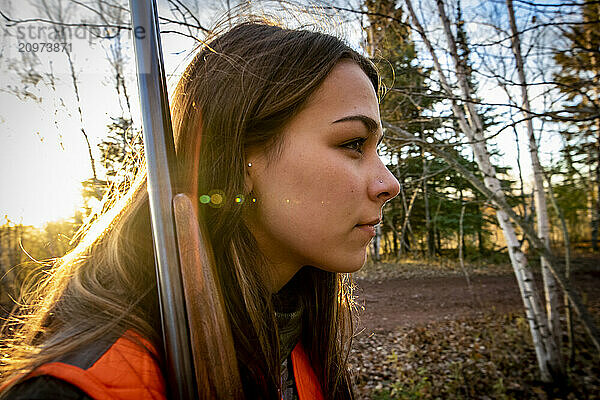 Portrait of young woman out hunting  Biwabik  Minnesota  USA