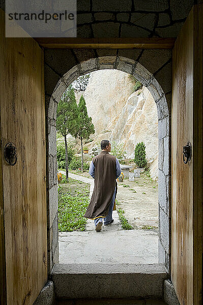 Shaolin Monk Shi De Jian and the San Huang Zhai Monastery on the Song Mountain  China.