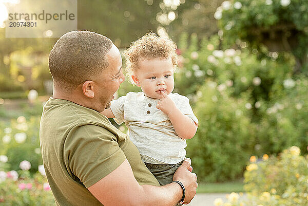 Father and son in garden