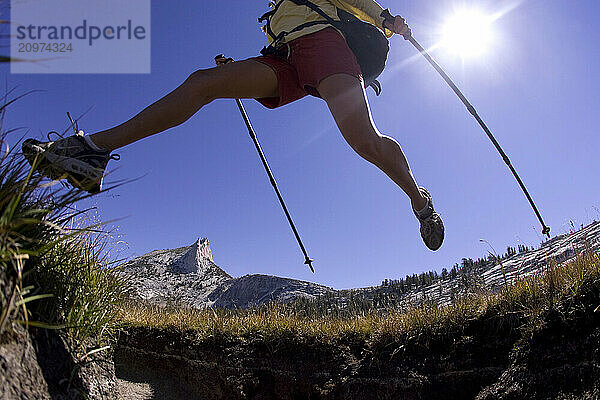 A woman backpacking in Yosemite National Park  California.