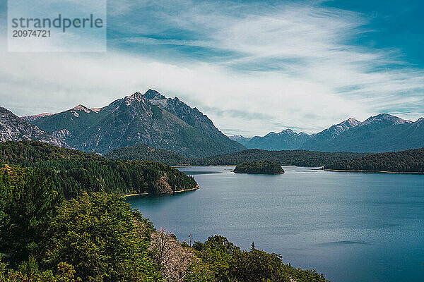 A beautiful lake with a small island in the middle