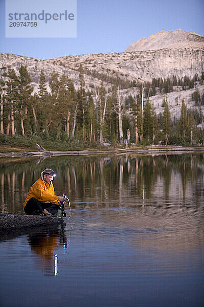 A woman backpacking in Yosemite National Park  California.