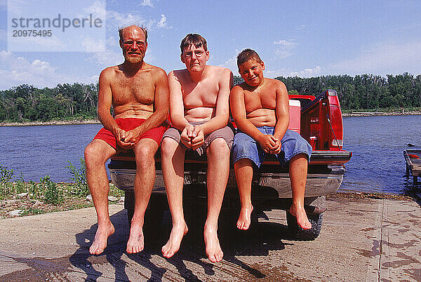 People on a truck tailgate.