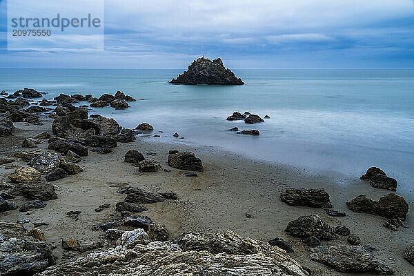 Sea stacks at the beach and dramatic sky  Aichi Prefecture  Japan