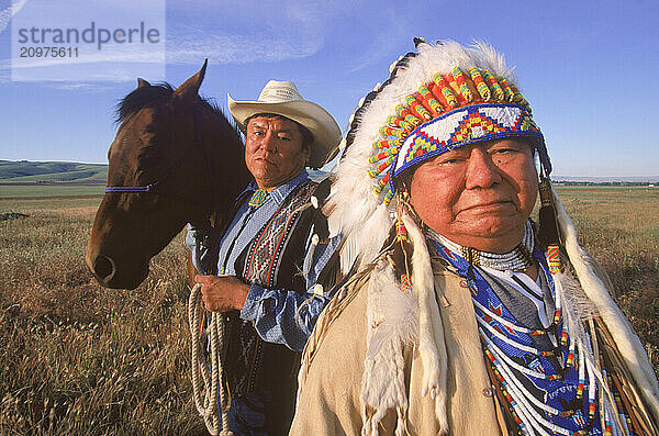 Native American chief in headress.