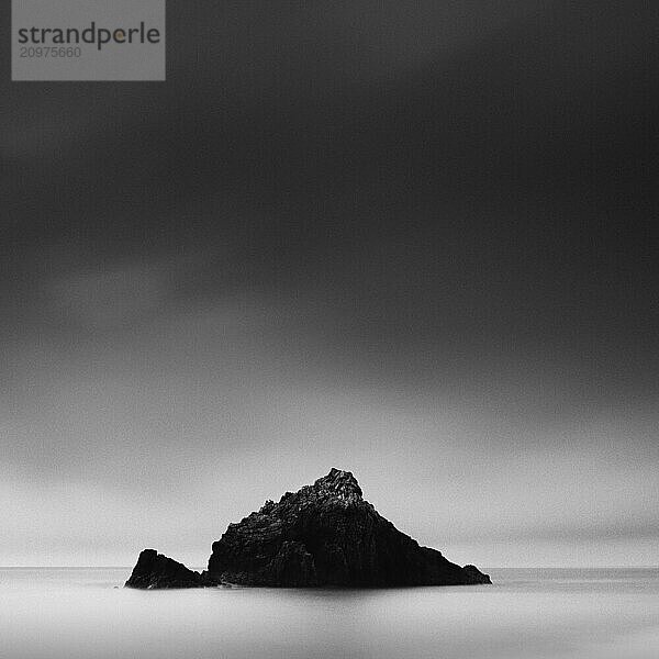 Sea stack at the beach and dramatic sky  Aichi Prefecture  Japan