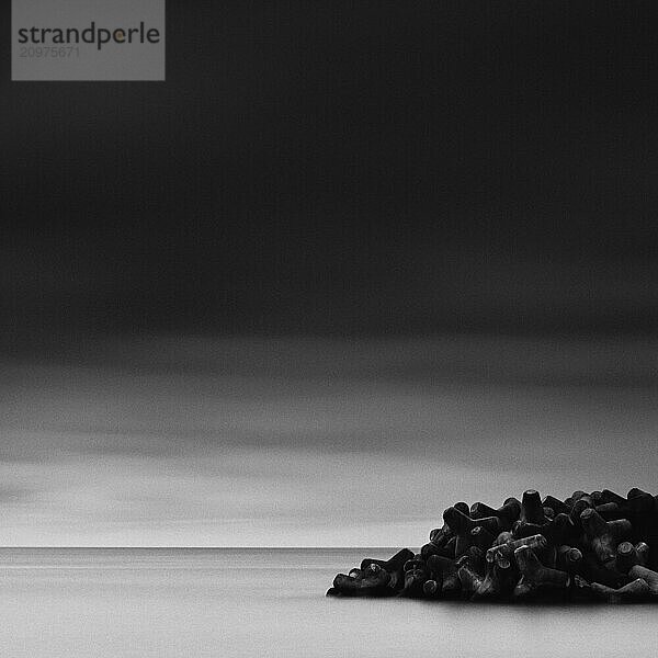 Tetrapods in the sea and dramatic sky  Shizuoka Prefecture  Japan