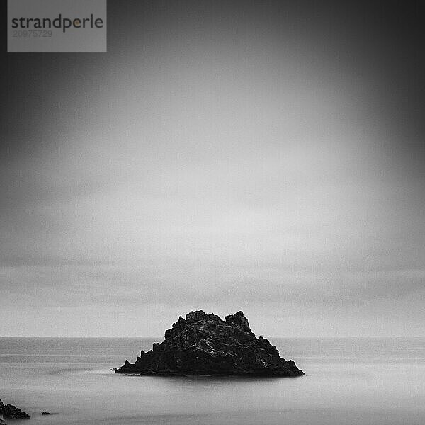 Sea stack at the beach and dramatic sky  Aichi Prefecture  Japan