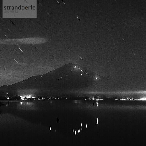 View of Mount Fuji on a summer night  Lake Yamanaka  Japan