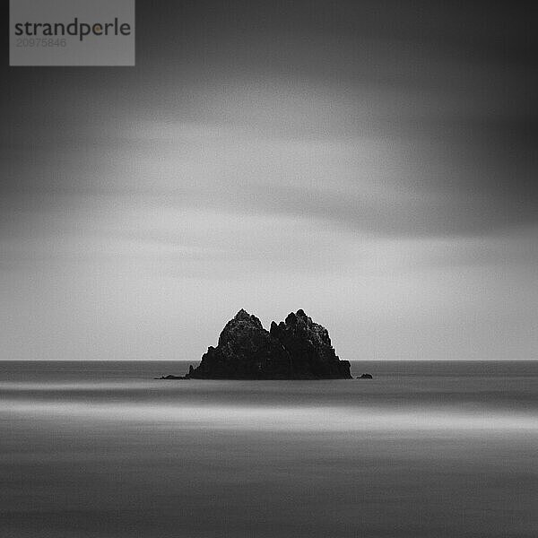 Sea stack at the beach and dramatic sky  Aichi Prefecture  Japan