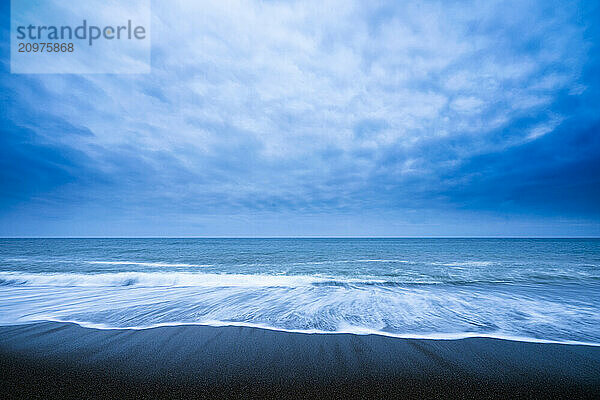 Sea waves and dramatic sky at the beach  Aichi Prefecture  Japan