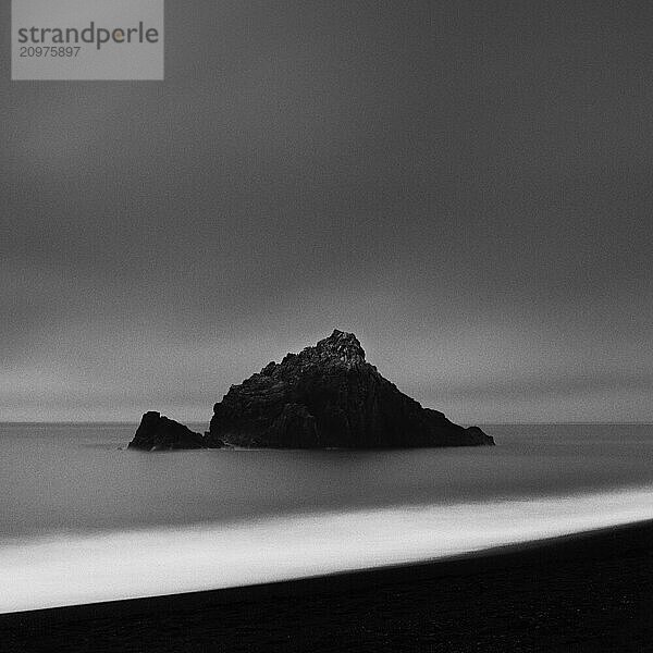 Sea stack at the beach and dramatic sky  Aichi Prefecture  Japan