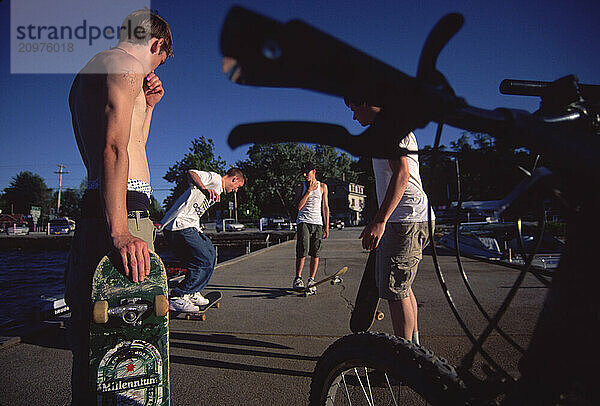 Tourist and teens in Naples  Maine.