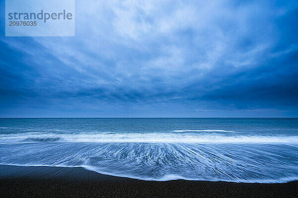 Sea waves and dramatic sky at the beach  Aichi Prefecture  Japan