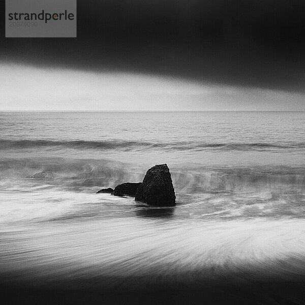 Sea stacks at the beach and dramatic sky  Aichi Prefecture  Japan