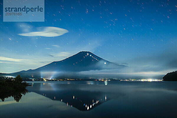 View of Mount Fuji on a summer night  Lake Yamanaka  Japan