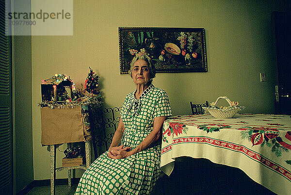 Portrait of a Cuban exile  Angelina Azel in her dining room.