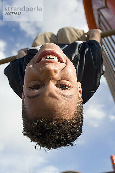 Young boy playing in playground in Sacramento  CA.