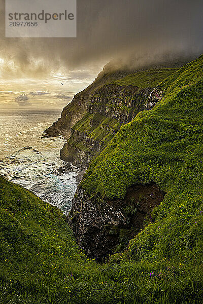 Scenic view of coastal cliffs  Gasadalur  Vagar  Faroe Islands