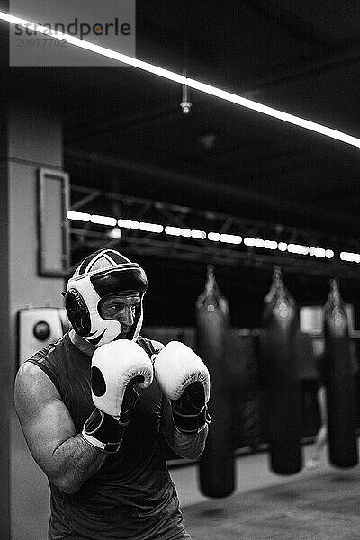 Boxers fighting in boxing training in the gym.