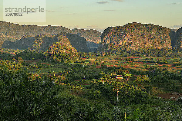 Sunrise over the limestone mogotes formations in the Vinales valley  Cuba