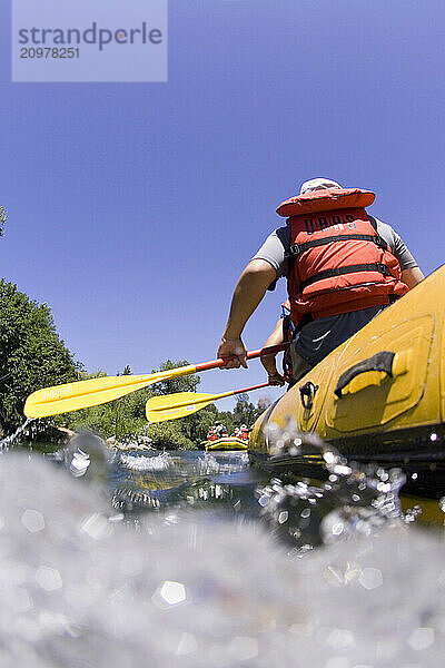 Group of people rafting down the South Fork of the American River. Coloma  CA