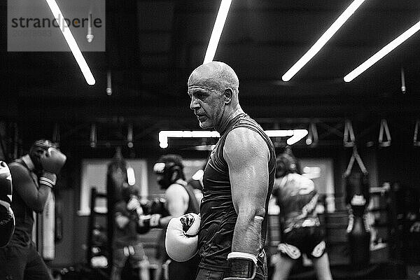 Boxers fighting in boxing training in the gym.