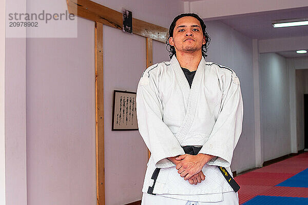 Judo fighter portrait in dojo