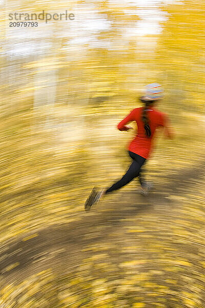 Young woman trail running near South Lake Tahoe  CA.