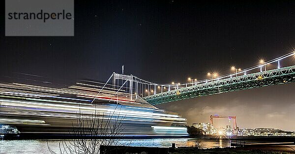 Gothenburg  Sweden  January 4 2014: A ferry passing the Älvsborgs bridge. Long exposure  Europe