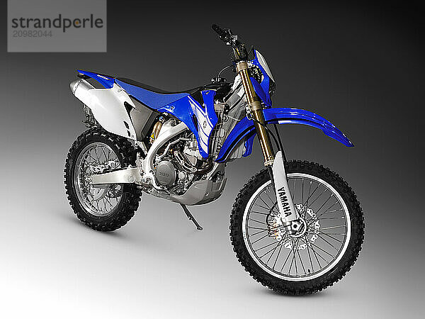 Yamaha YZ 125 2006 low weight powerful off-road racing bike Isolated silhouette on gray background with clipping path