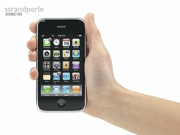 Apple iPhone 3Gs 3G smartphone in a hand isolated on white background. High quality photo