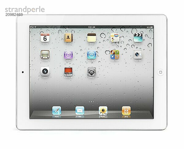 Apple iPad 2 tablet computer with desktop icons on its display. Isolated with clipping path on white background