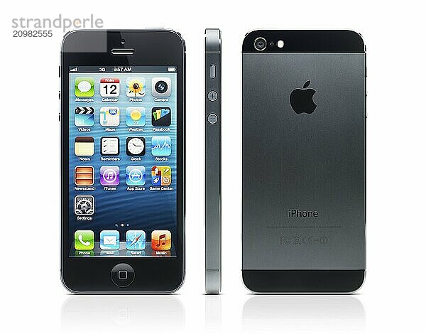 Apple iPhone 5 black with desktop icons on its display side and rear views isolated on white background with clipping path