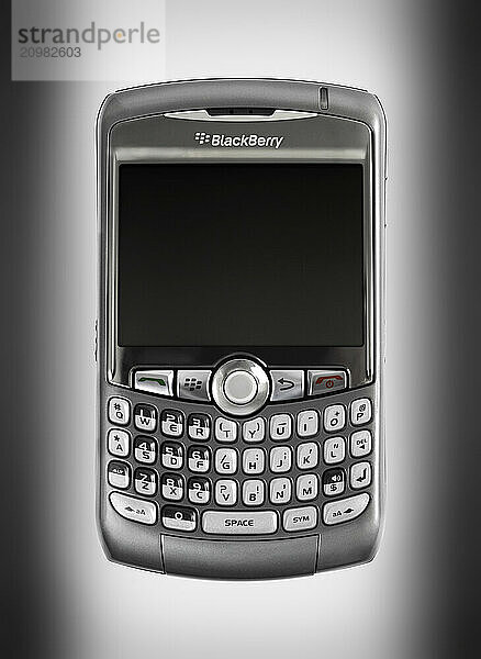 Strock photo of BlackBerry 8310 Curve Smartphone Isolated silhouette with a clipping path on white gray background