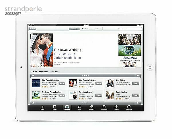 Apple iPad 2 tablet computer with iTunes TV shows featuring the royal wedding on its display. Isolated with clipping path on white background